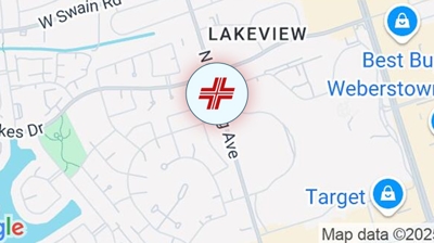 A digital map shows the Lakeview area with a red medical cross symbol marking a location on N Pershing Ave. Nearby, Best Buy WebersTown and Target are labeled. Streets and part of a waterway are visible. | California Urgent Care Center